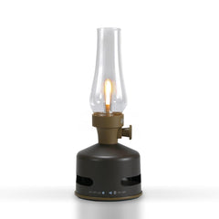 KOOKOO MoriMori lamp with loudspeaker in choco-brown on a wooden patio