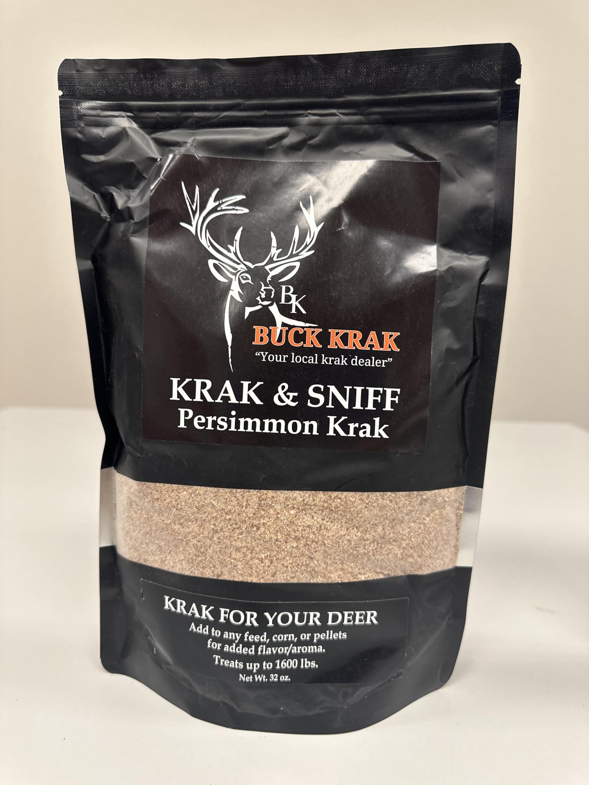 Krak & Sniff Buck Krak bottle pour demonstrates aroma booster for attracting deer.
