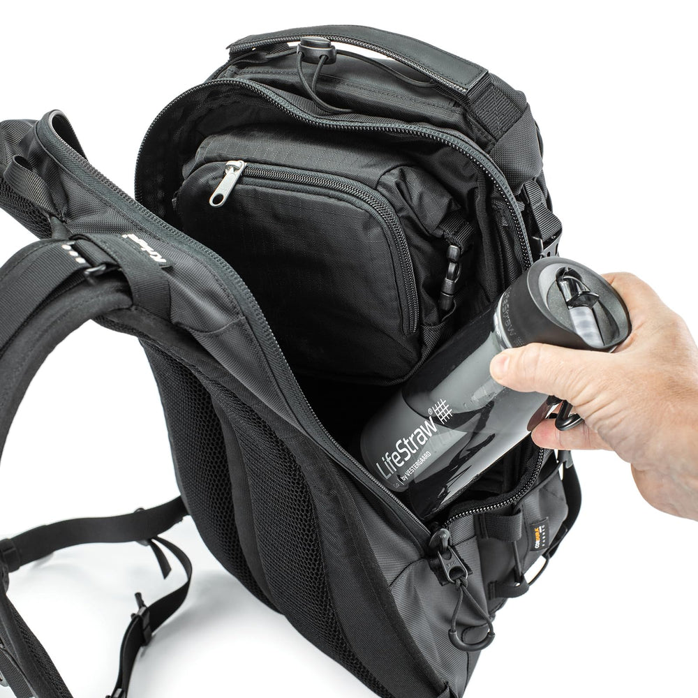 Kriega Trail 18 roll-top closure securing gear