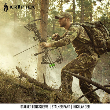 Kryptek Stalker Pant stealth camouflage Highlander back showing mobility in terrain.