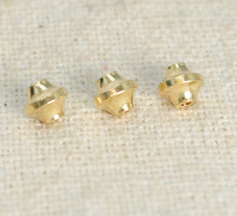 Assorted brass lure bodies for fishing beads and weights