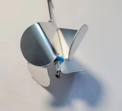 KTGCOZS buzz blade spinning action showing smooth rotation and water flash.