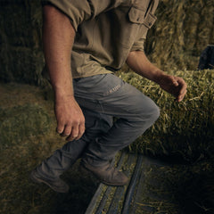 KUIU Guide Pro Pant articulated fit supports movement across rugged terrain.