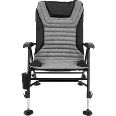Kuma Off Grid Chair by lake enables comfy seating during outdoor chats.
