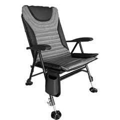Kuma Off Grid Chair on rough terrain provides stable seating for outdoor adventures.