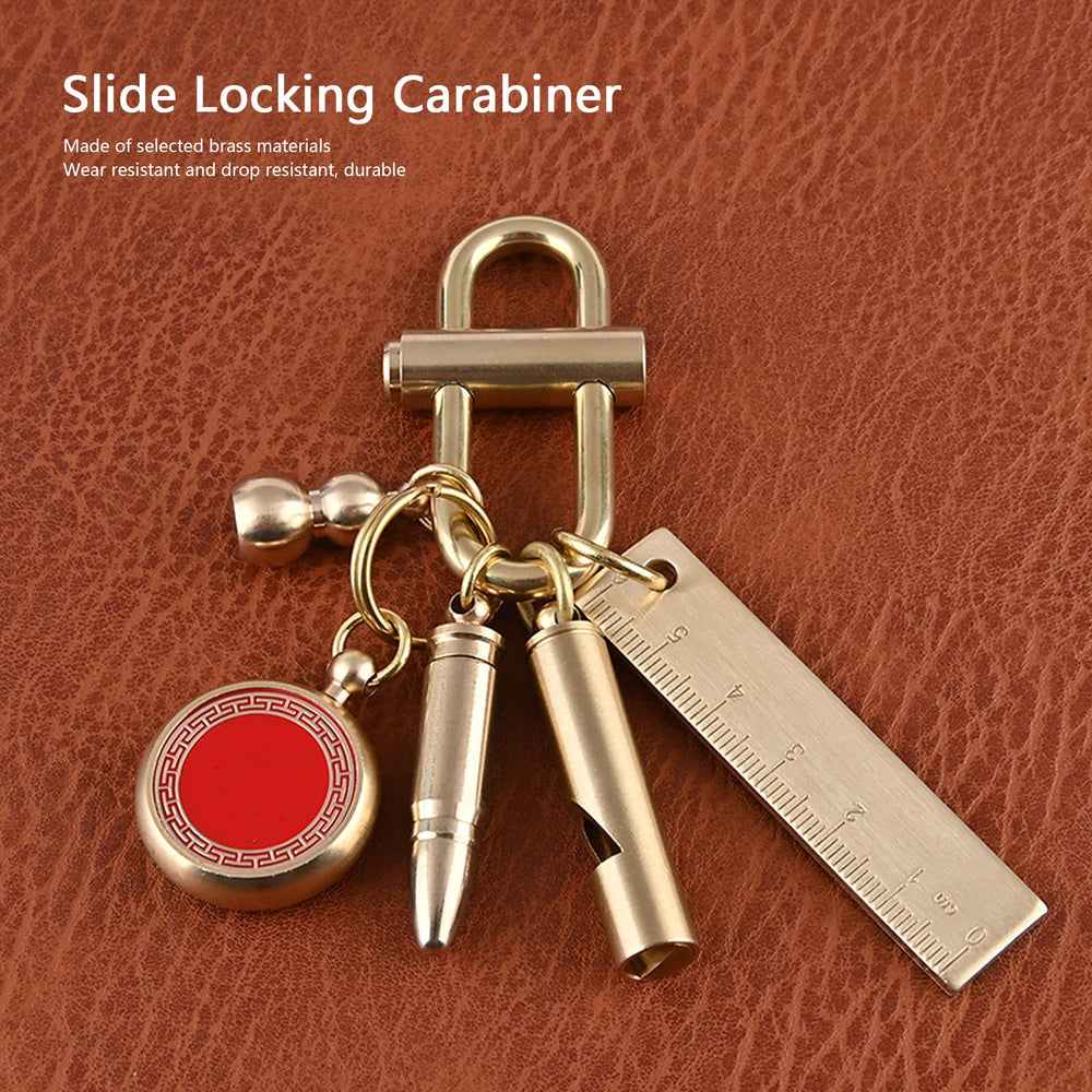 Kuuleyn brass lock keychain on hiking gear ready for outdoor adventures.