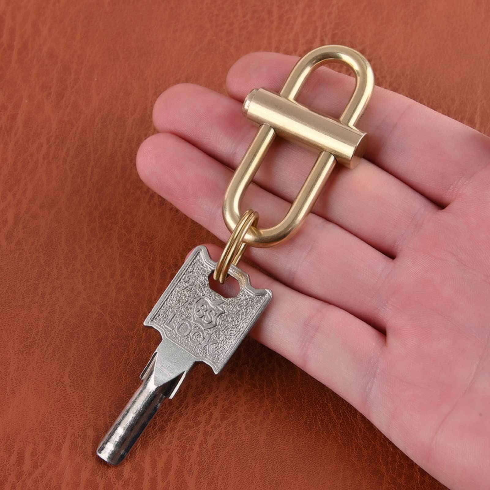 Kuuleyn brass lock keychain ready for travel with compact profile.