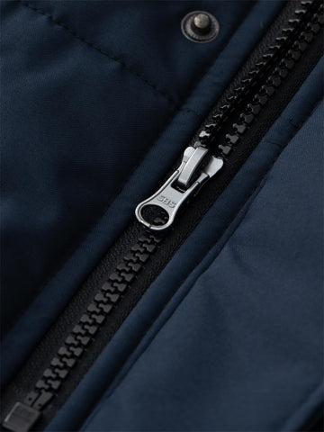 KVE parka's adjustable cuffs seal out drafts during cold commutes.