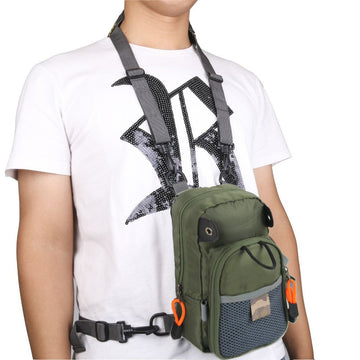 Angler wearing chest pack during trout fishing