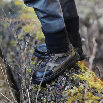 Kylebooker wading boot with mesh upper and reinforced toe for foot protection.