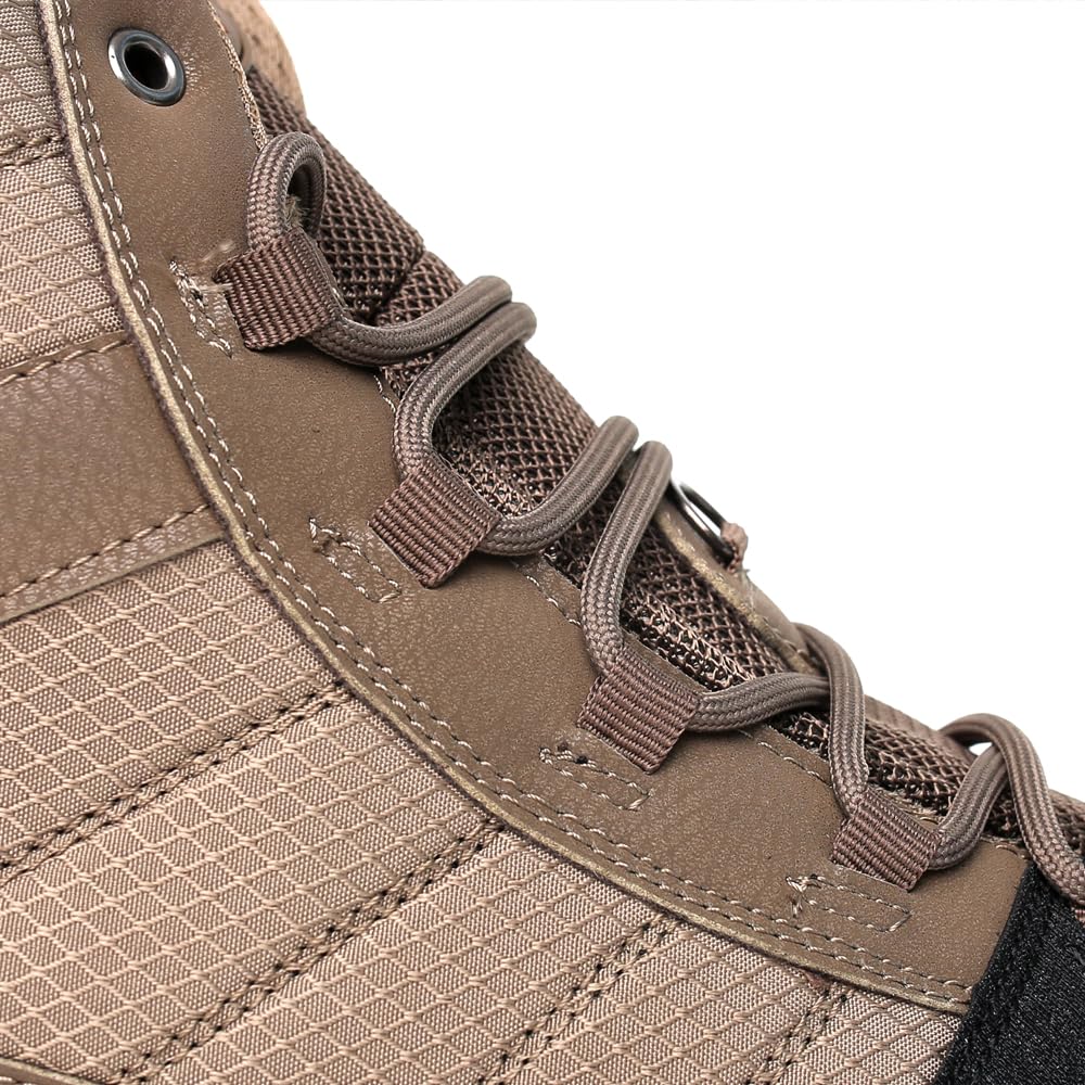 Kylebooker men's wading boots on river rocks demonstrating stability in current