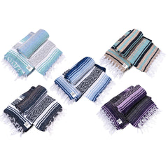 La Montana authentic Mexican blanket folded for couch decor and travel comfort.