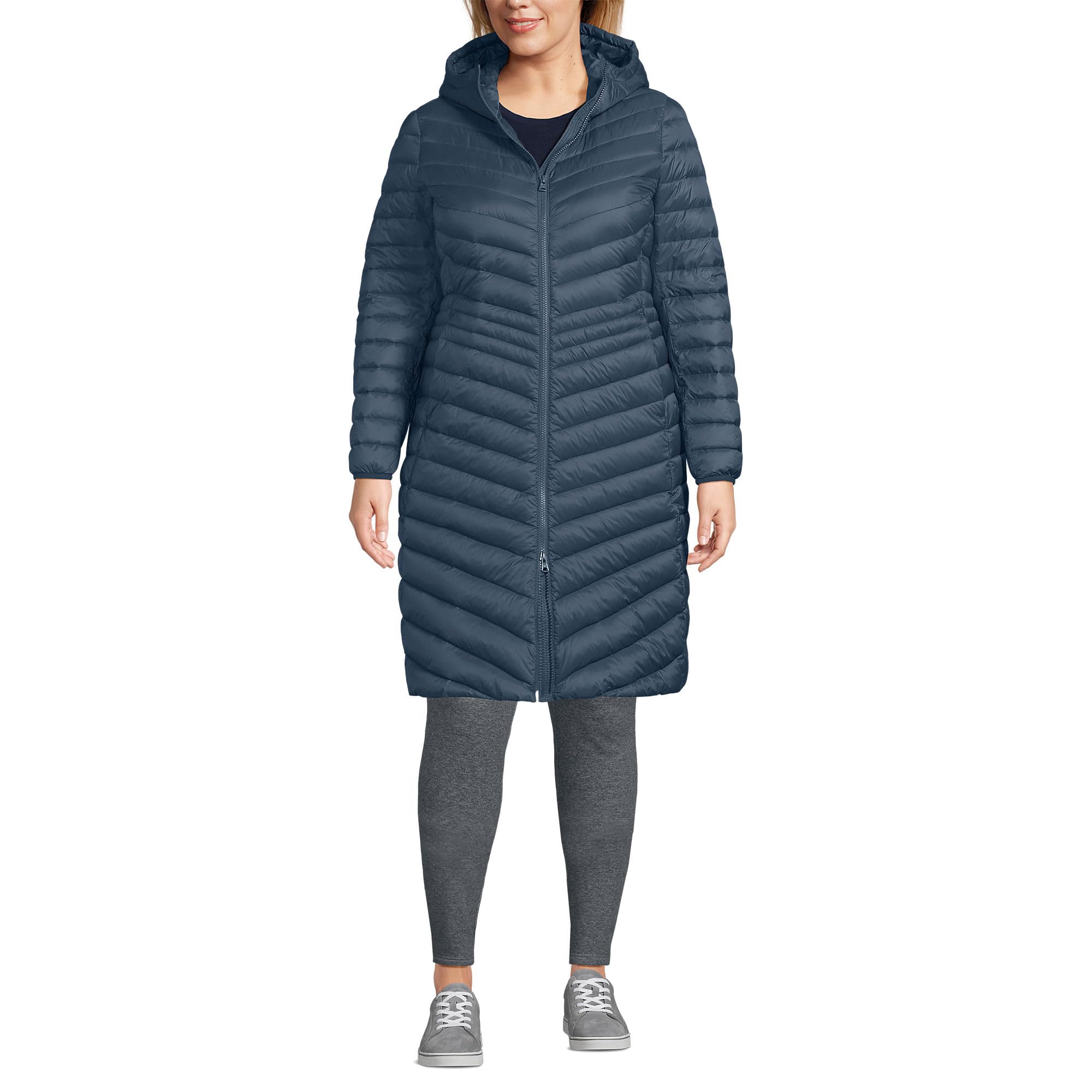 Lands' End packable chevron wanderweight down coat in vintage blue on a snowy city commute