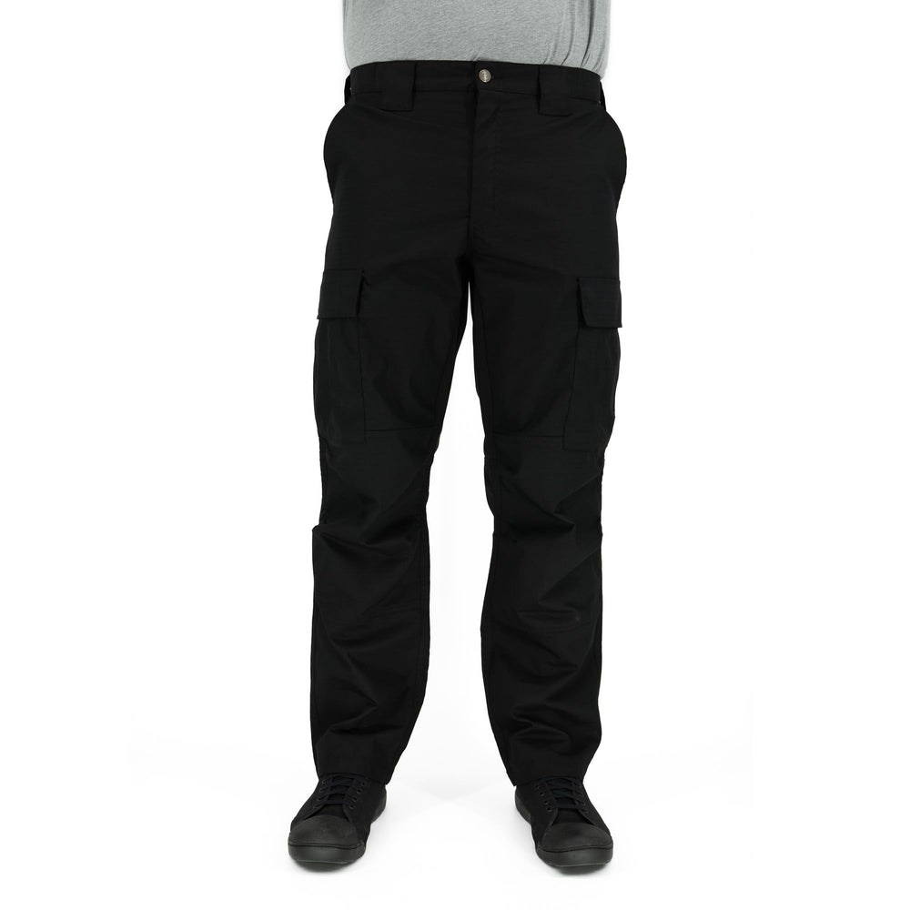 LA Police Gear Atlas BDU cargo pants articulated knees in rugged terrain.