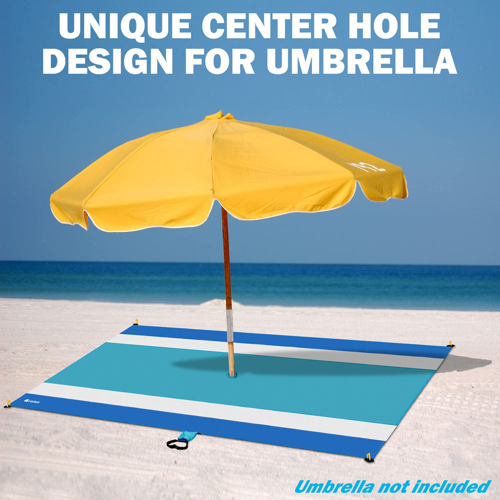 Laybax beach blanket used under canopy for shade and play.