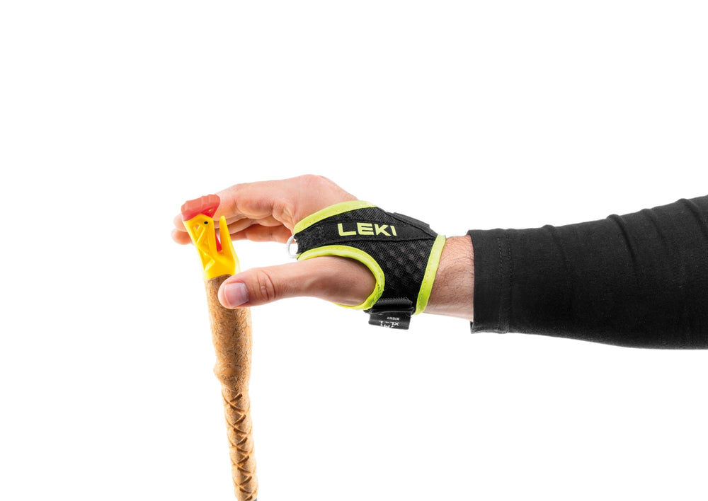 LEKI Ultratrail FX.One red-black colorway on rugged trail