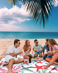 LEQIOLENNG beach blanket with stakes, windproof stability on breezy days.