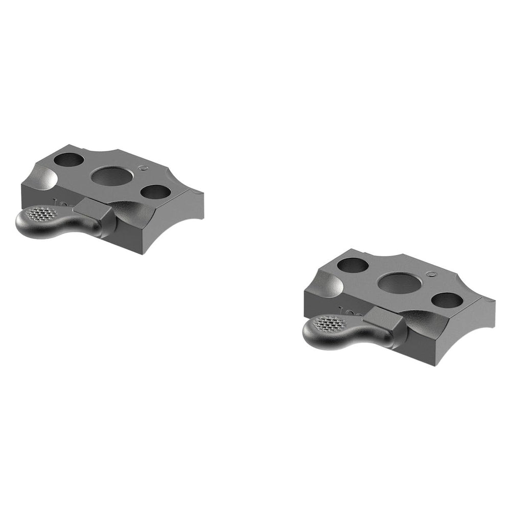Leupold QR base shows quick removal and reattachment with compatible rings for fast swaps.