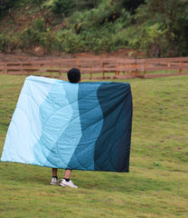 LH Outdoor Puffy Blanket hood detachable shows versatile warmth options.