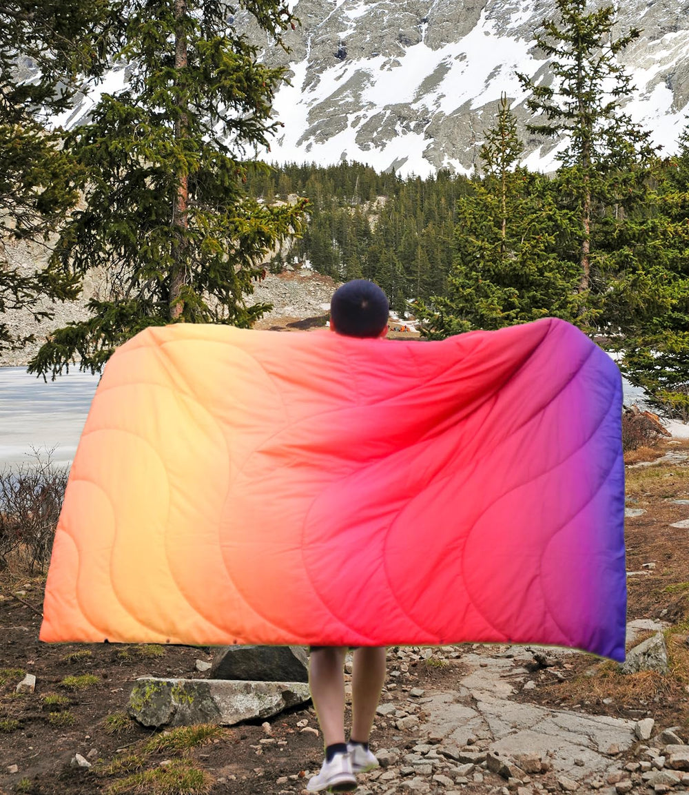 LH Outdoor Puffy camping blanket in portable bag ready for quick setup on trips