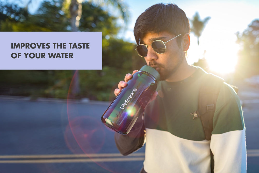 LifeStraw Go Series bottle in-use at a sink for convenient on-the-go hydration.
