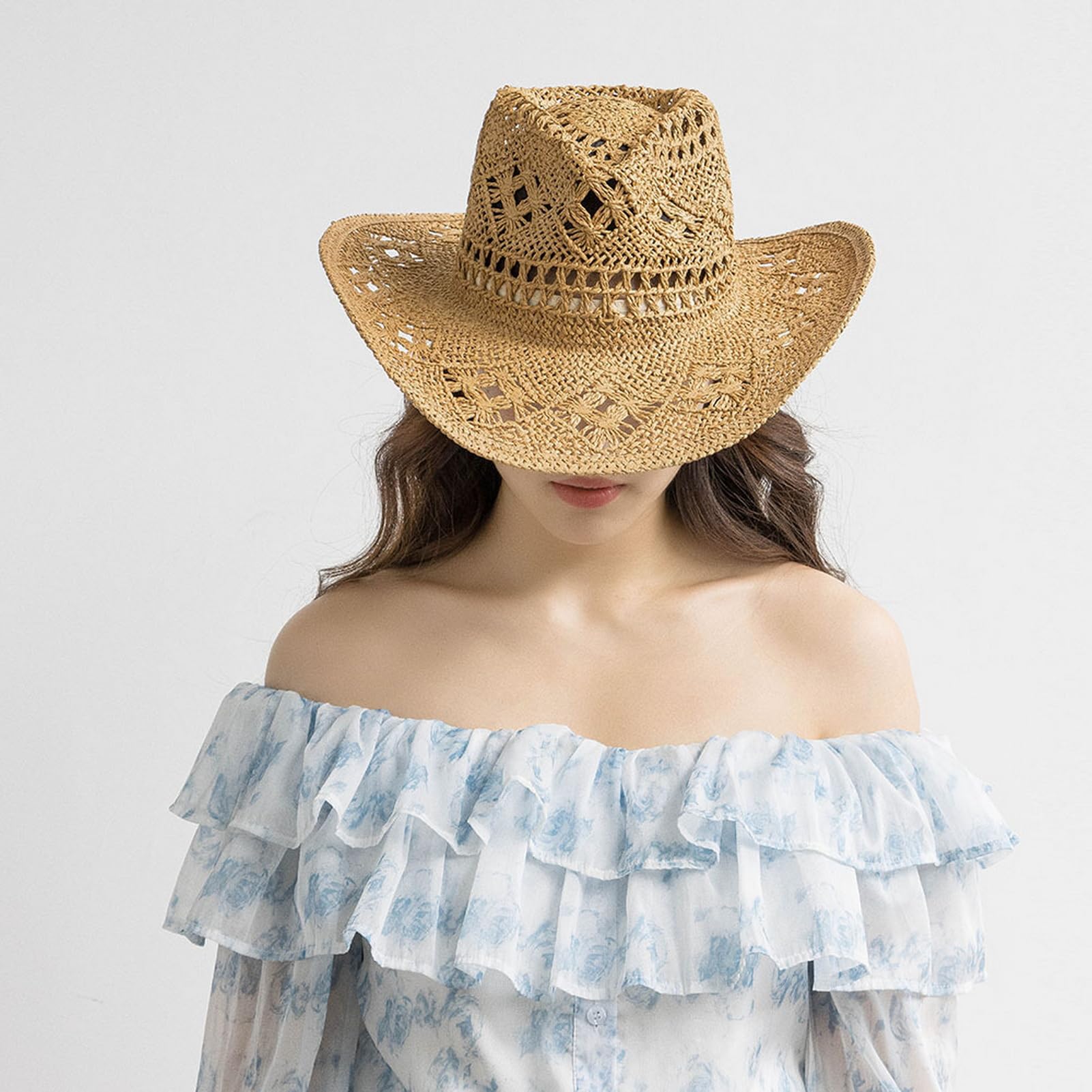 Lifup yellow beach-ready straw cowboy hat shielding face on sunny days