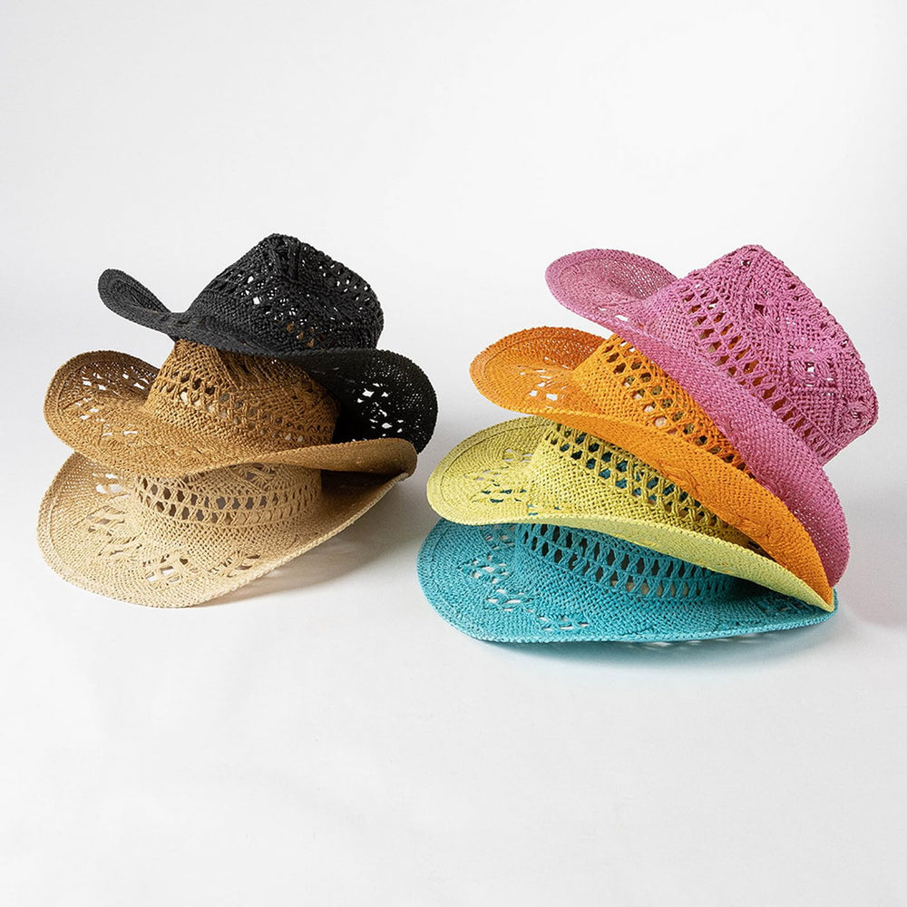 Lifup straw hat pictured during outdoor activities like hiking.