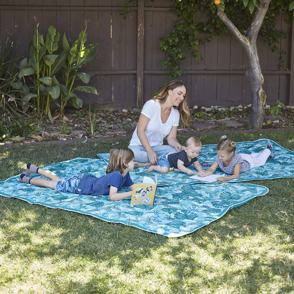 Lightspeed Outdoors XL blanket at a park setting ready for family time