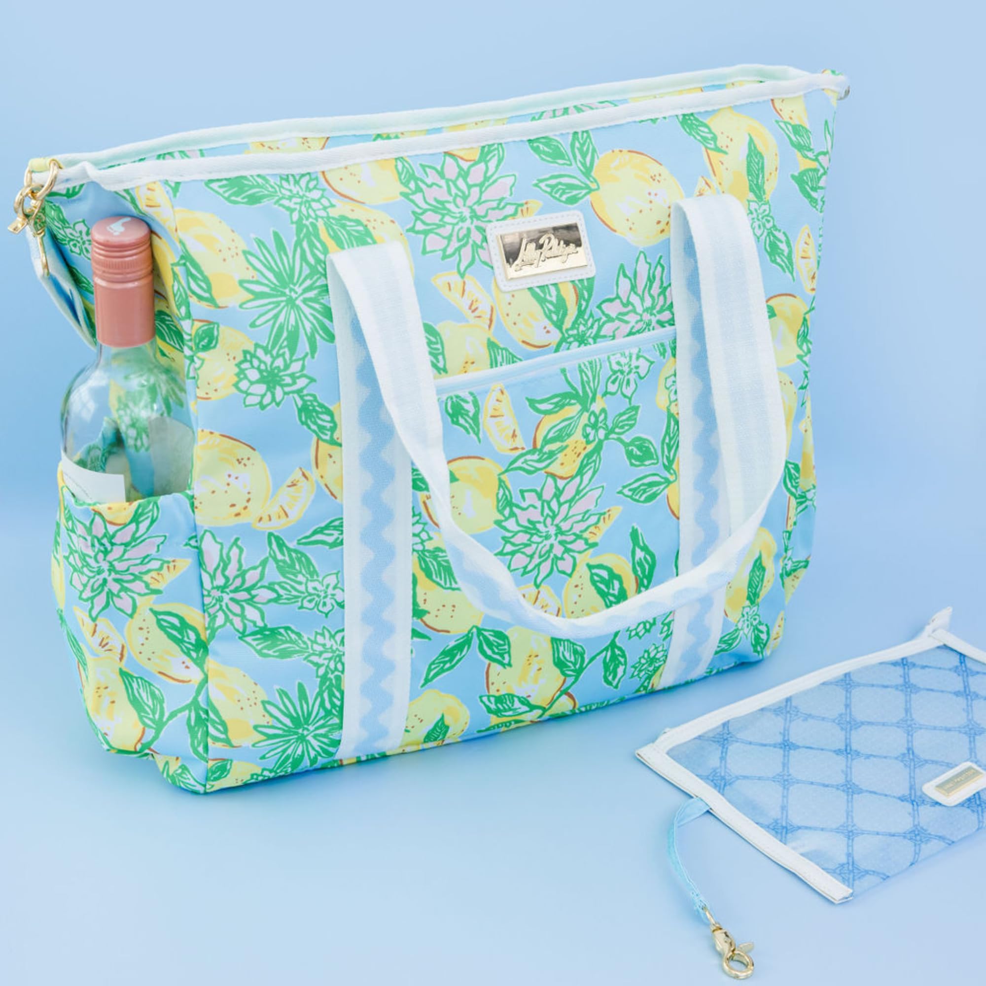 Lilly Pulitzer yellow picnic cooler on picnic setup conveys ready-to-use freshness at gatherings.