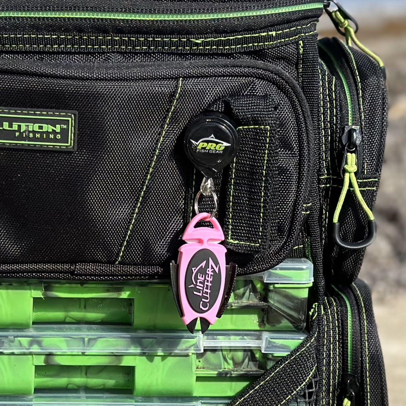 LINE CUTTERZ steel clip attaches to hat bills for quick access.