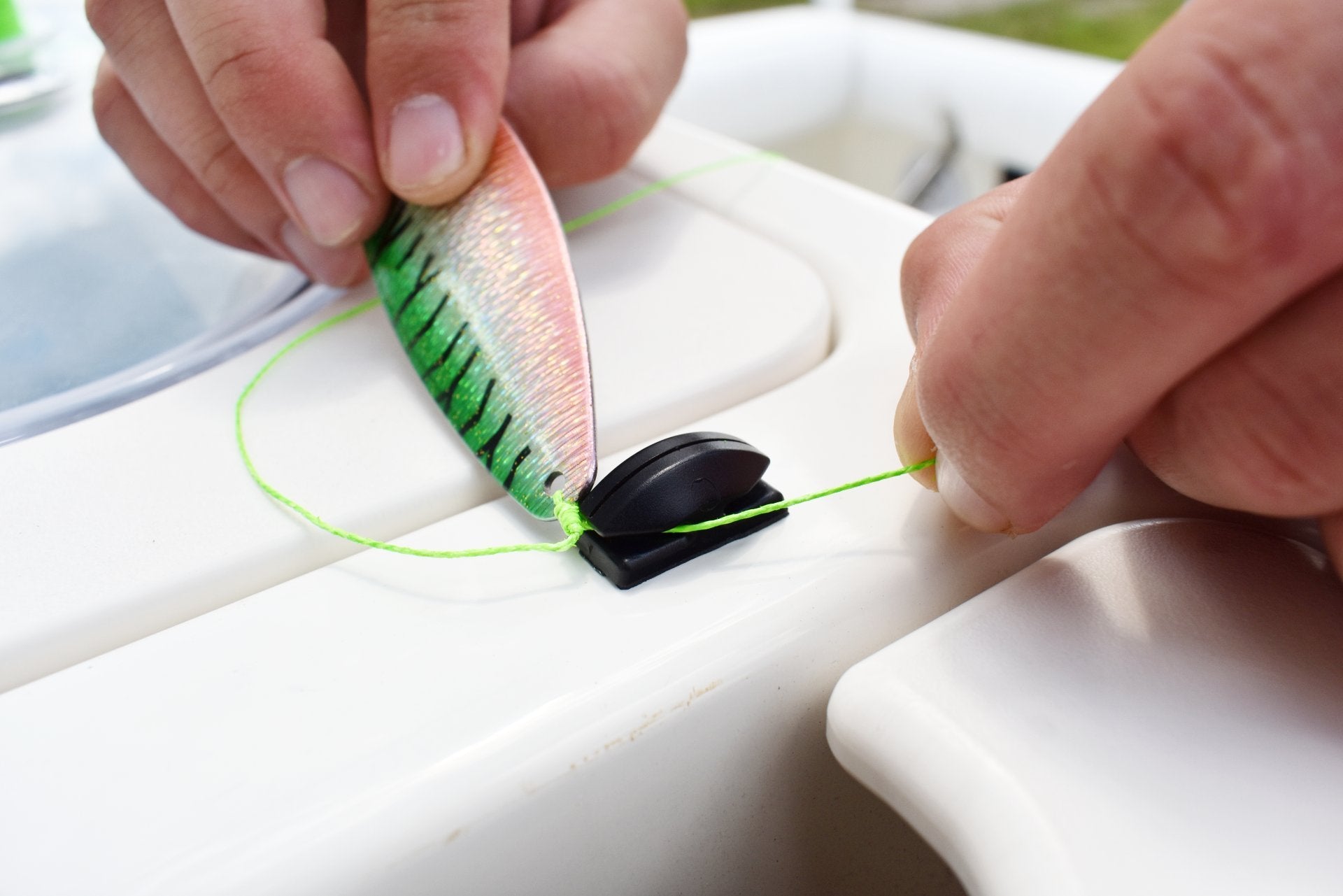 LINE CUTTERZ adhesive mount on smooth surface supports easy access.