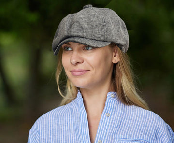 Outdoor wear: man wearing dark gray linen newsboy hat