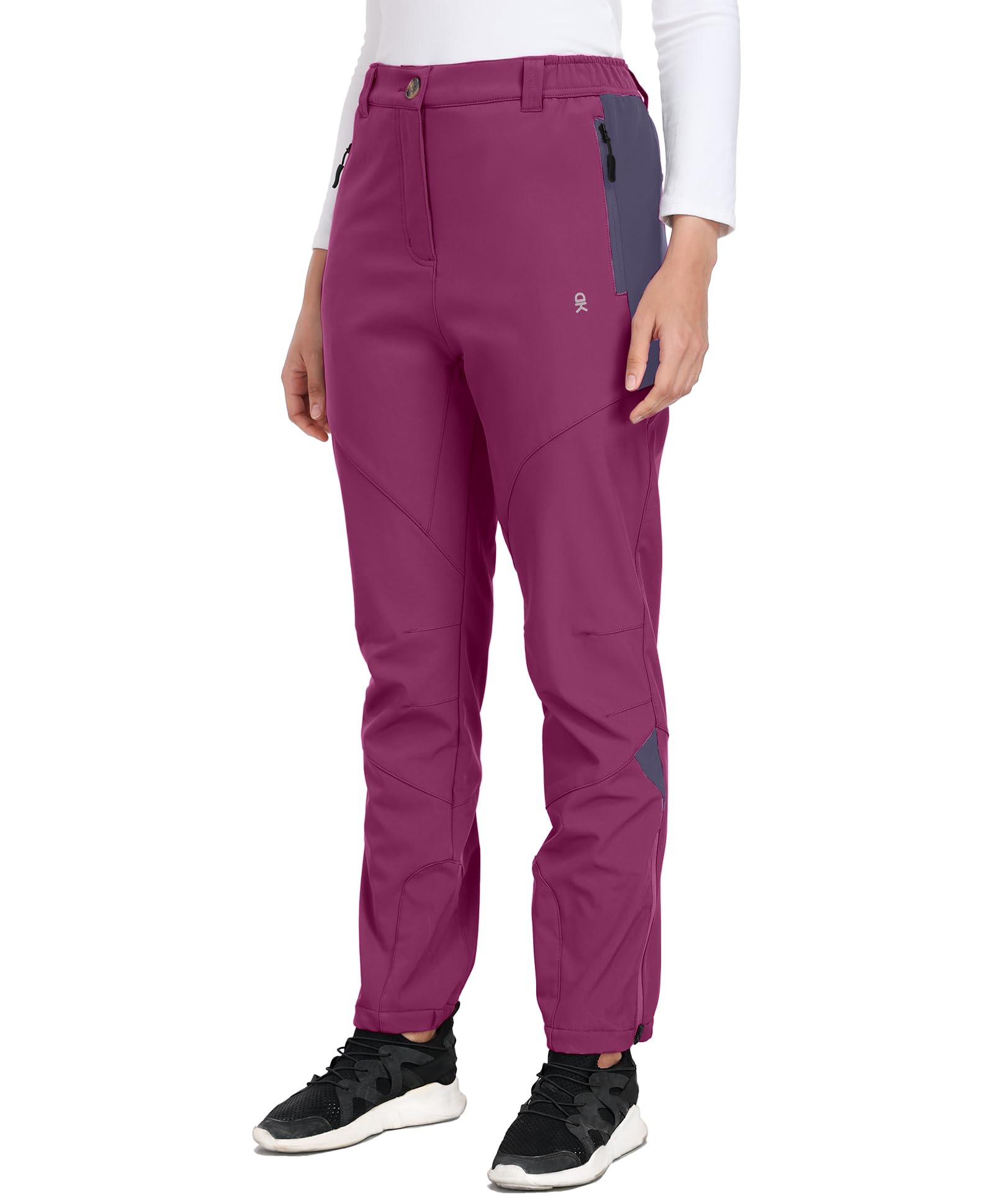 Little Donkey Andy purple pants with articulated knees enabling easier movement on slopes.