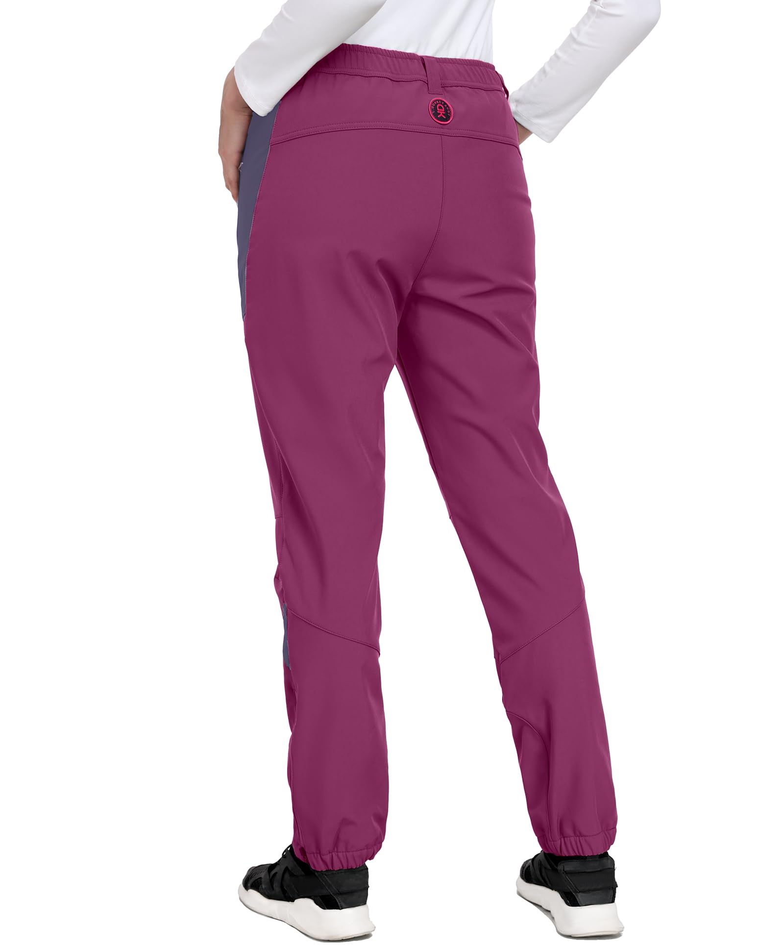 Little Donkey Andy purple pants with zip pockets for secure storage during hikes.