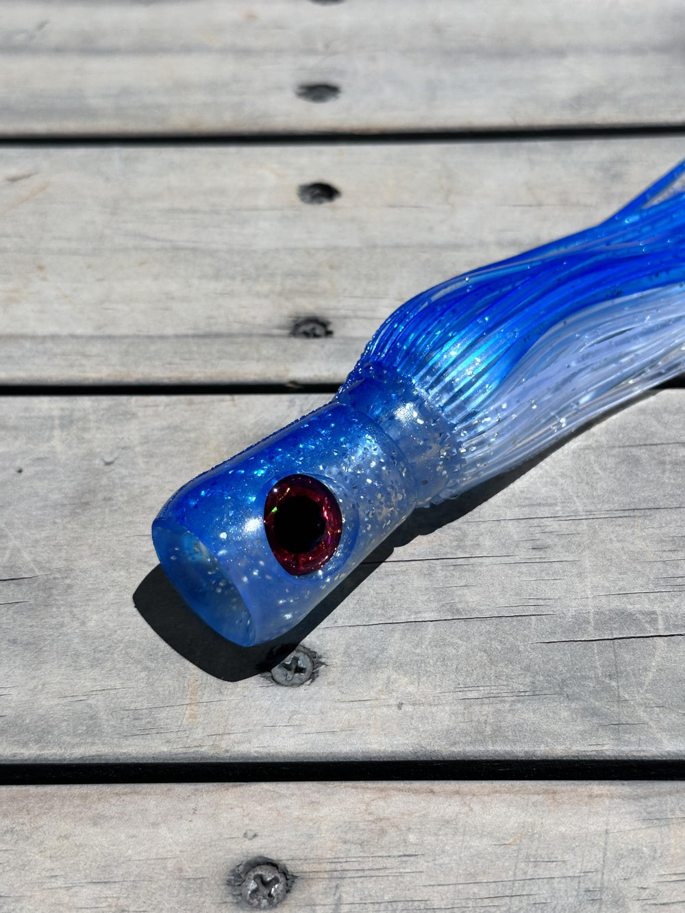 Lobo Lures Big Chugger cupped face and soft body attracting pelagic fish