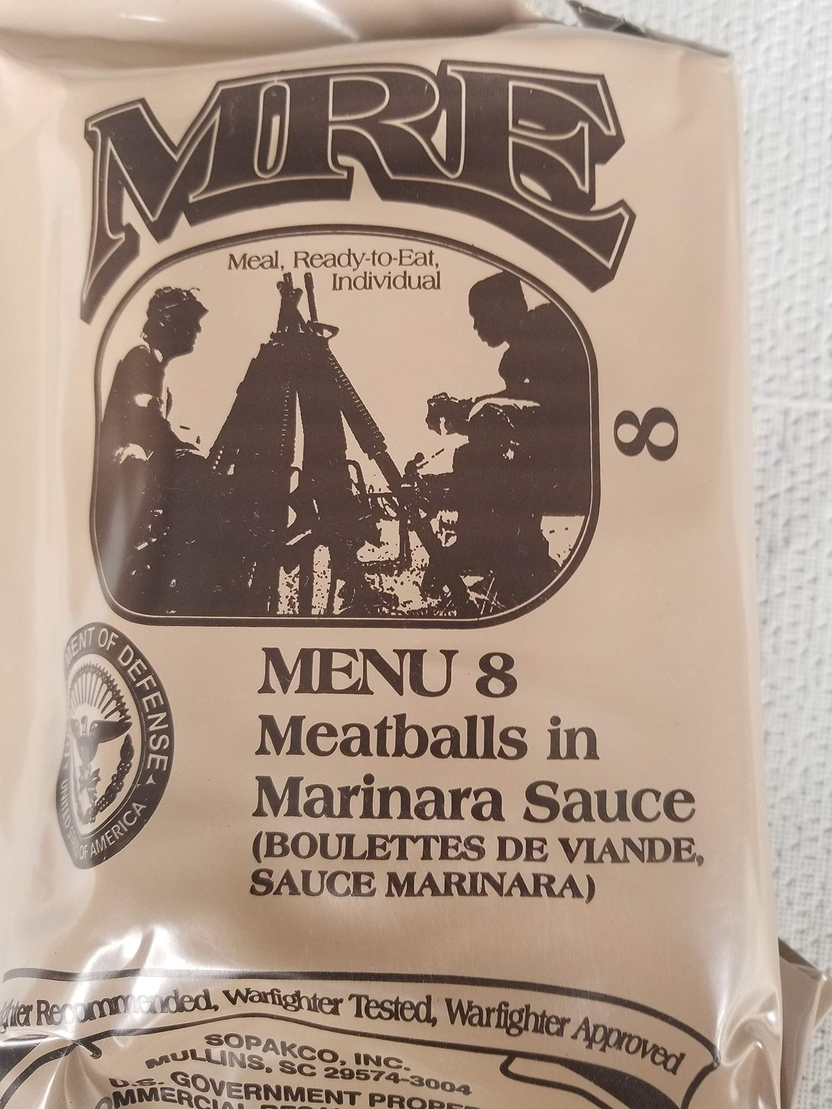 LoJo Surplus MRE meatballs in marinara, ready-to-eat for camping and emergencies.