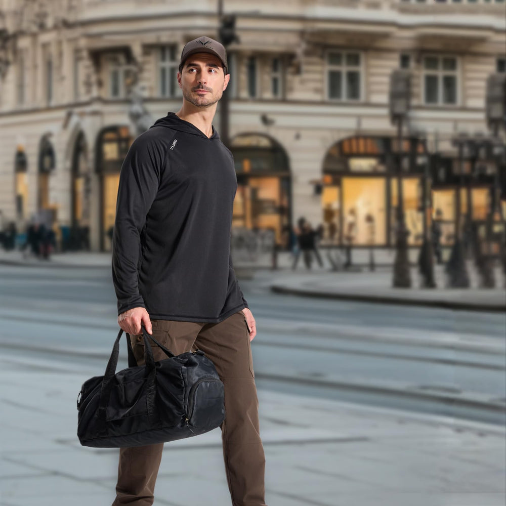LOOGU cargo pants water-resistant close-up demonstrating rain protection.