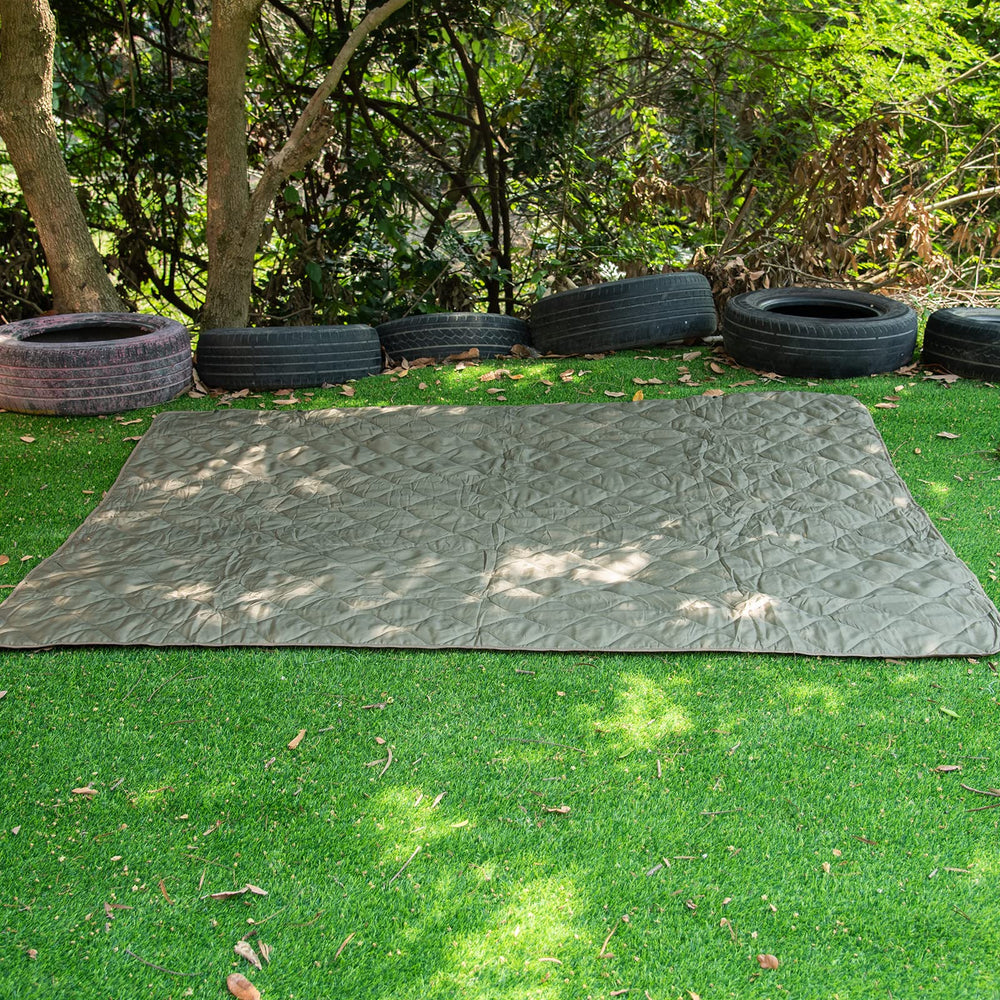 LOOGU multi-use blanket serves as outdoor mat, beach blanket, or picnic cover.