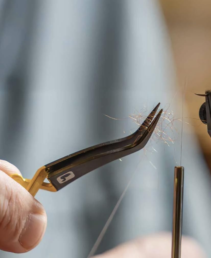 Loon Outdoors fly tying tool showing ergonomic grip and smooth tips for tiny patterns