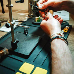 Loon Outdoors Rigging Mat surface protection shields a workspace during resin work