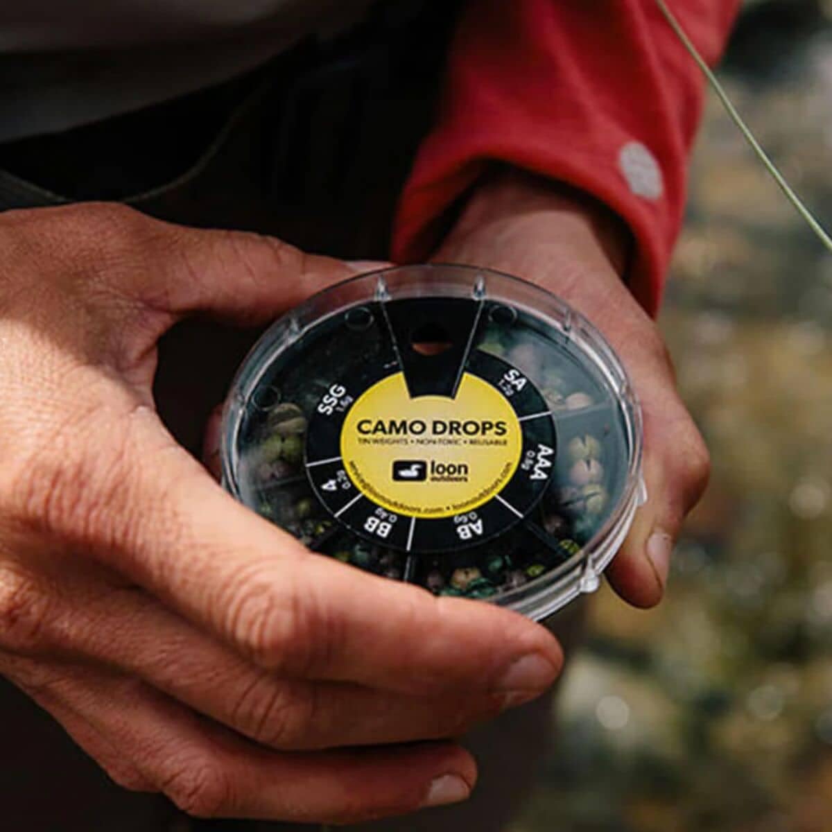 Loon Tin Drops Twist Pot twist mechanism for easy dispensing in the field