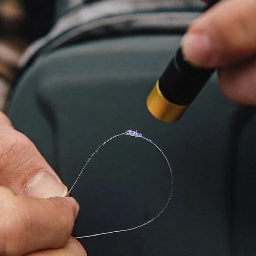 Loon UV Knot Sense repairing damaged flies with quick-setting, UV-activated solution.