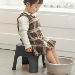 Lovskoo Plastic Mini Stool in living room, serves as extra seating at a glance.