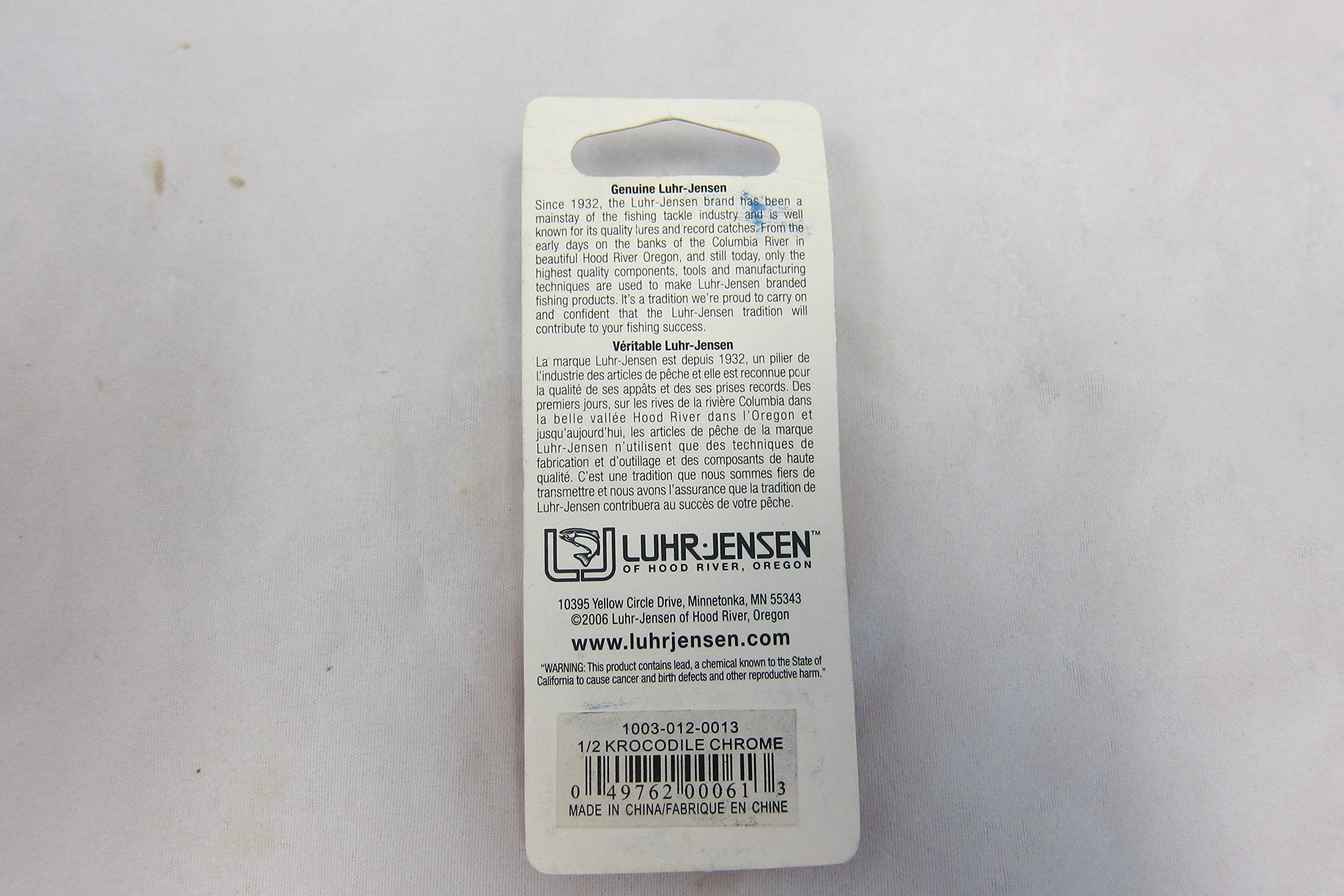 Luhr Jensen Krocodile Chrome lure, close-up on treble hook and hardware boosts rugged reliability.
