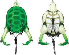 Lunkerhunt Prop Turtle lure gliding on water with bubble trail to attract bass.