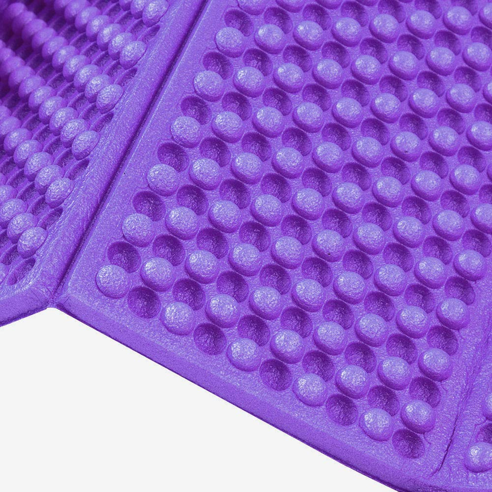 Beach tent setup with Luqeeg pad creates a comfortable ground layer.