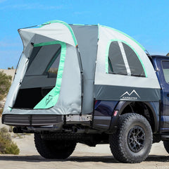 M KARMATER pickup tent waterproof coating shields campers from rain at a roadside site.