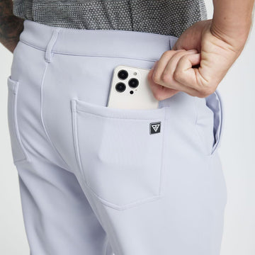 M MAELREG pants zipper and button detail ensuring secure fit.