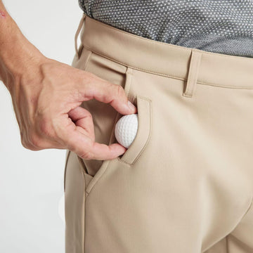 M MAELREG pants feature spare-button detail and clean waistband for quick fixes.