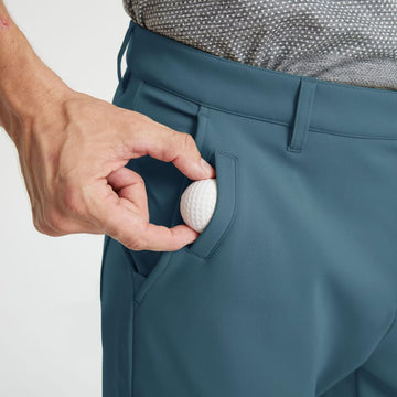 M MAELREG men's golf pants in use during winter hiking or golf for warmth and mobility.